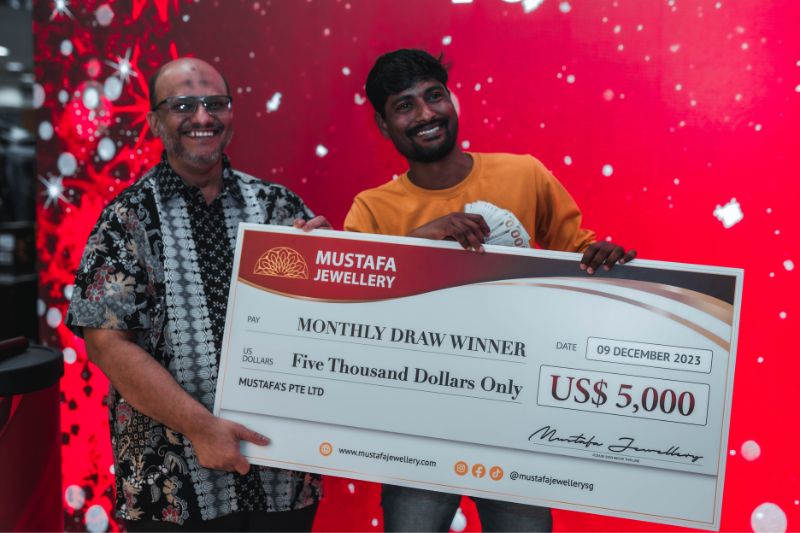 Mustafa Jewellery Lucky Draw Winner Cheque
