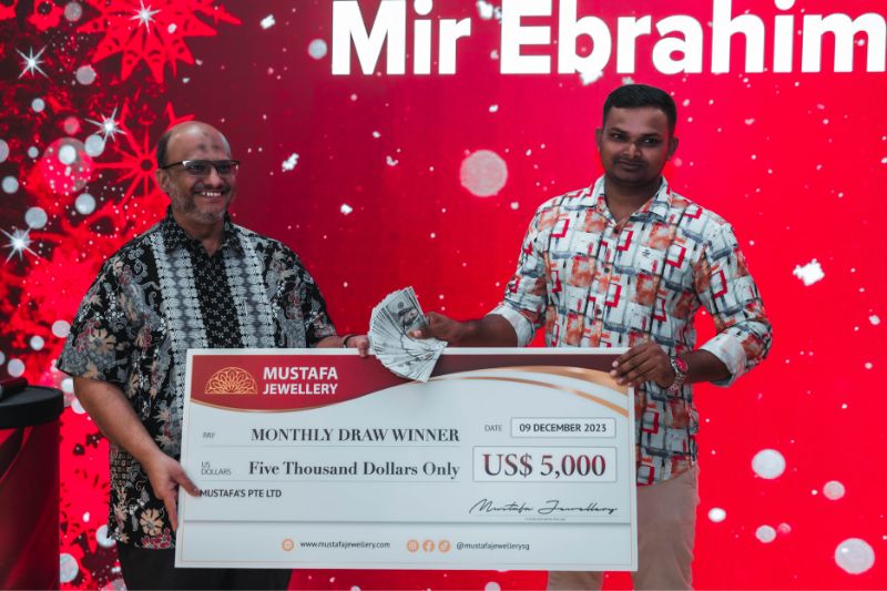 Mustafa Jewellery Lucky Draw Winner Cheque