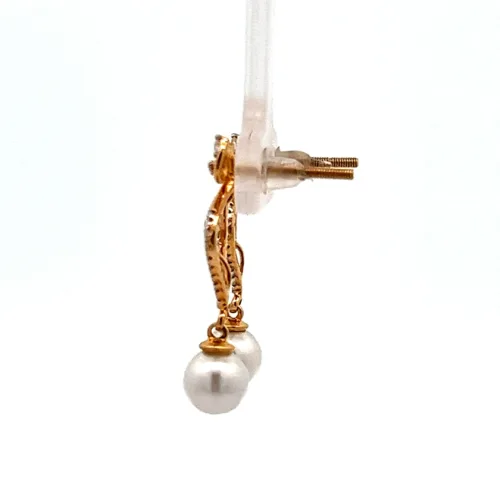 Regal Pearl Earrings - Left